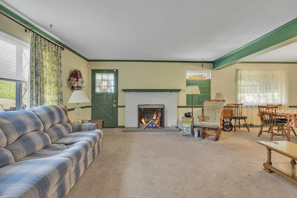4178 South R 1022 New Brighton, PA 15066 - Photo 17 of 33 a living room with furniture and a fireplace