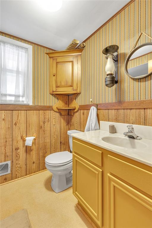 4178 South R 1022 New Brighton, PA 15066 - Photo 28 of 33 a bathroom with a toilet sink and mirror