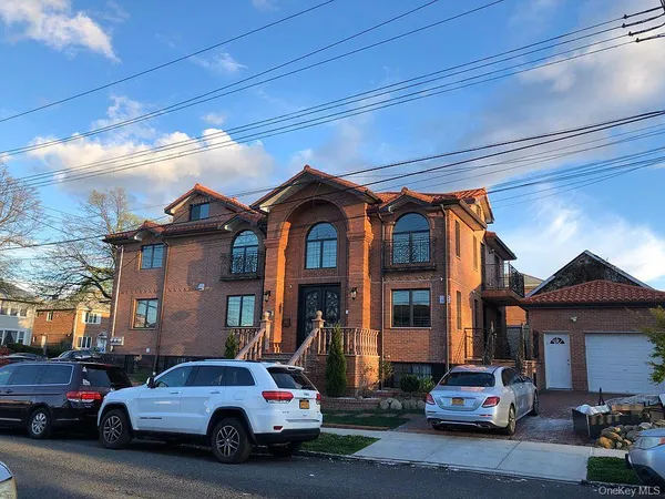 a car parked in front of a house