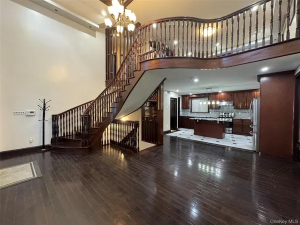 a view of entryway with wooden floor