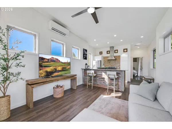 a view of kitchen with cabinets and wooden floor
