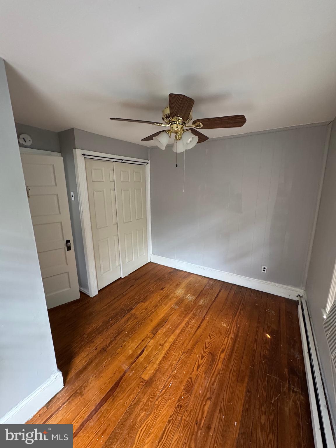 976 Upper Gulph Road Wayne, PA 19087 - Photo 7 of 12 a view of a room with wooden floor and staircase