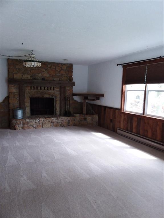 2519 South Ridge Road Shelocta, PA 15774 - Photo 19 of 24 LIVING ROOM WITH WOOD FIREPLACE, CLOSETS AND COULD BE USED AS A 4TH BEDROOM