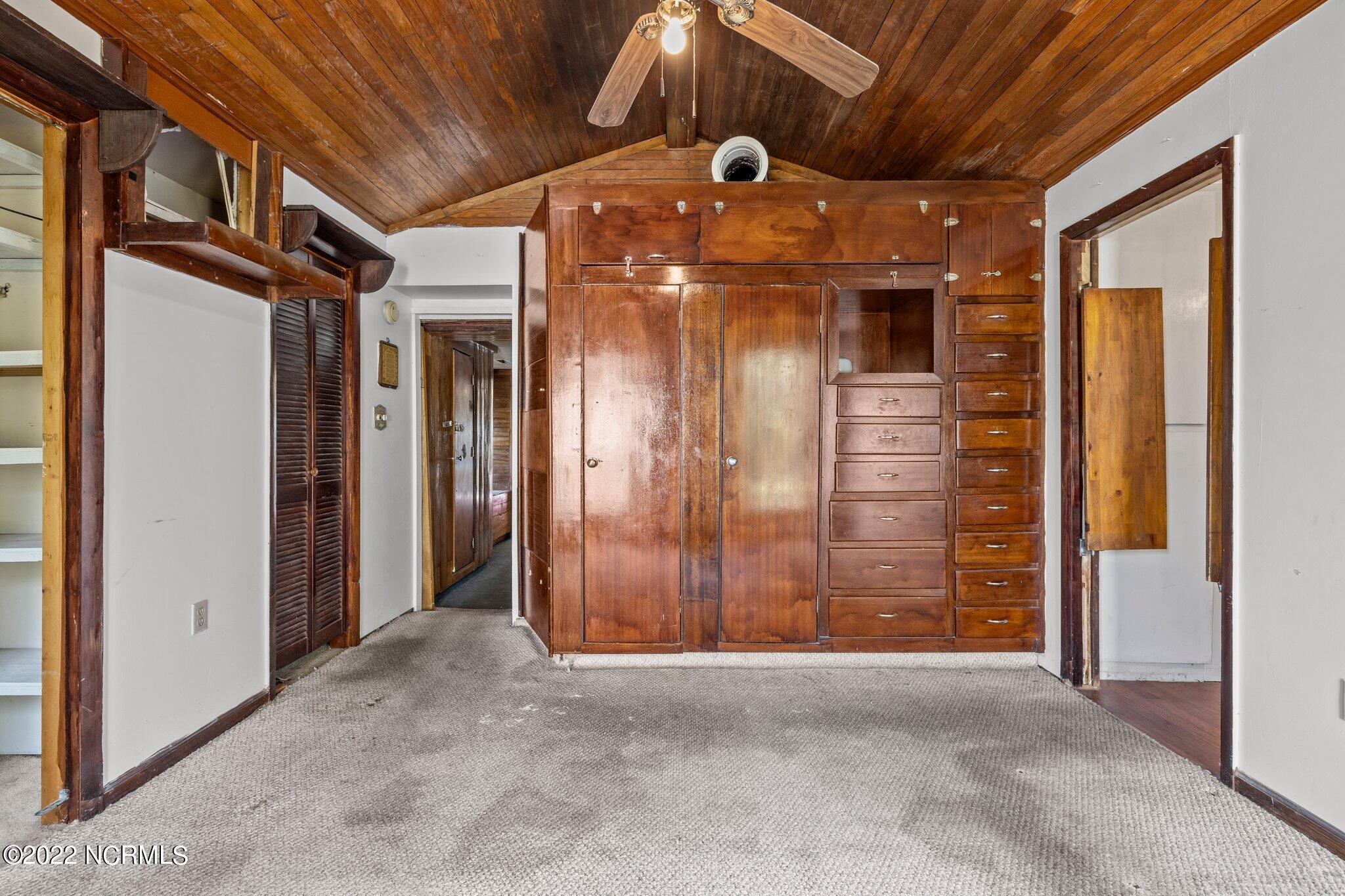 245 Old Winberry Road Newport, NC 28570 - Photo 14 of 22 Master Bedroom With Built Ins
