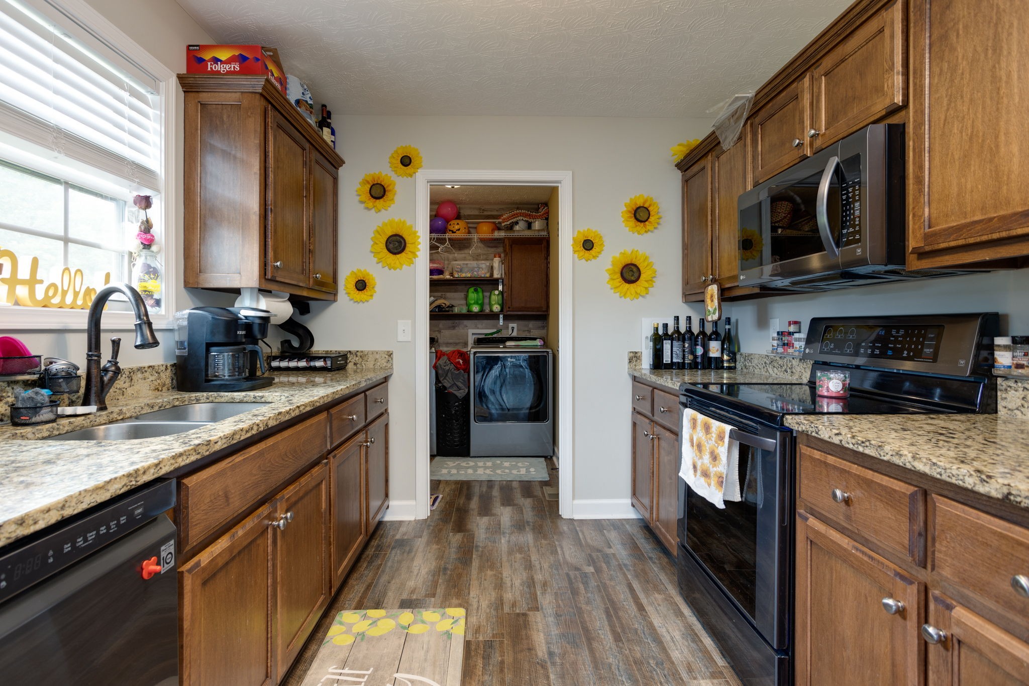 330 Tom Ferrell Road Portland, TN 37148 - Photo 13 of 29 a kitchen with stainless steel appliances granite countertop a refrigerator and a stove top oven