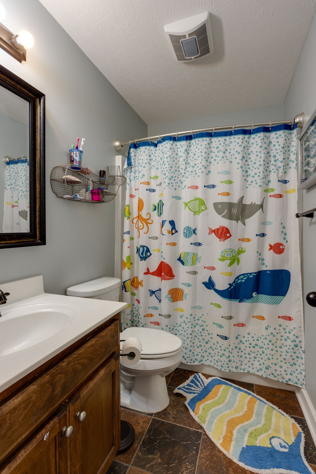 330 Tom Ferrell Road Portland, TN 37148 - Photo 22 of 29 a bathroom with a sink toilet and shower