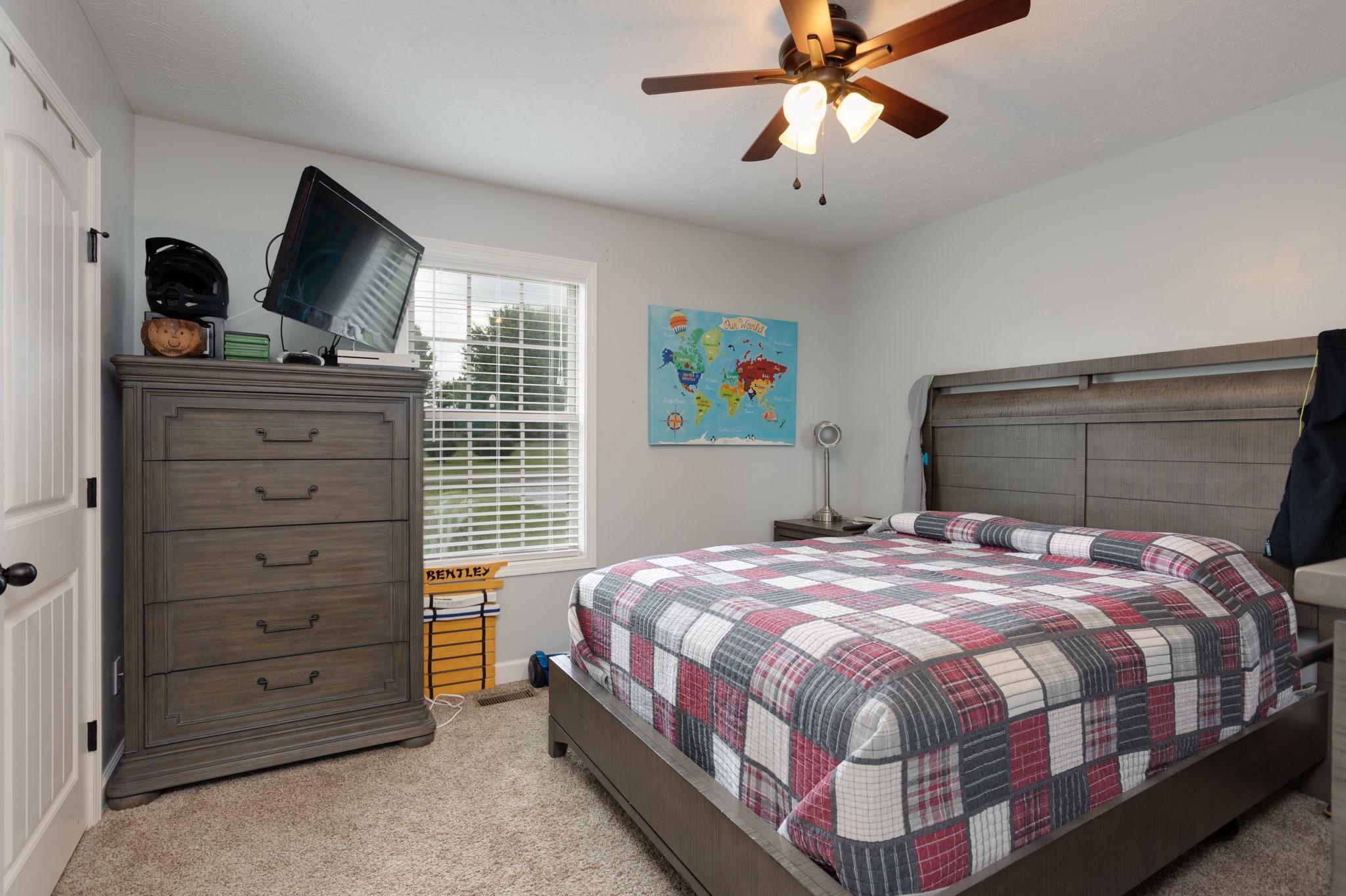 330 Tom Ferrell Road Portland, TN 37148 - Photo 23 of 29 a bedroom with a bed and a flat tv screen