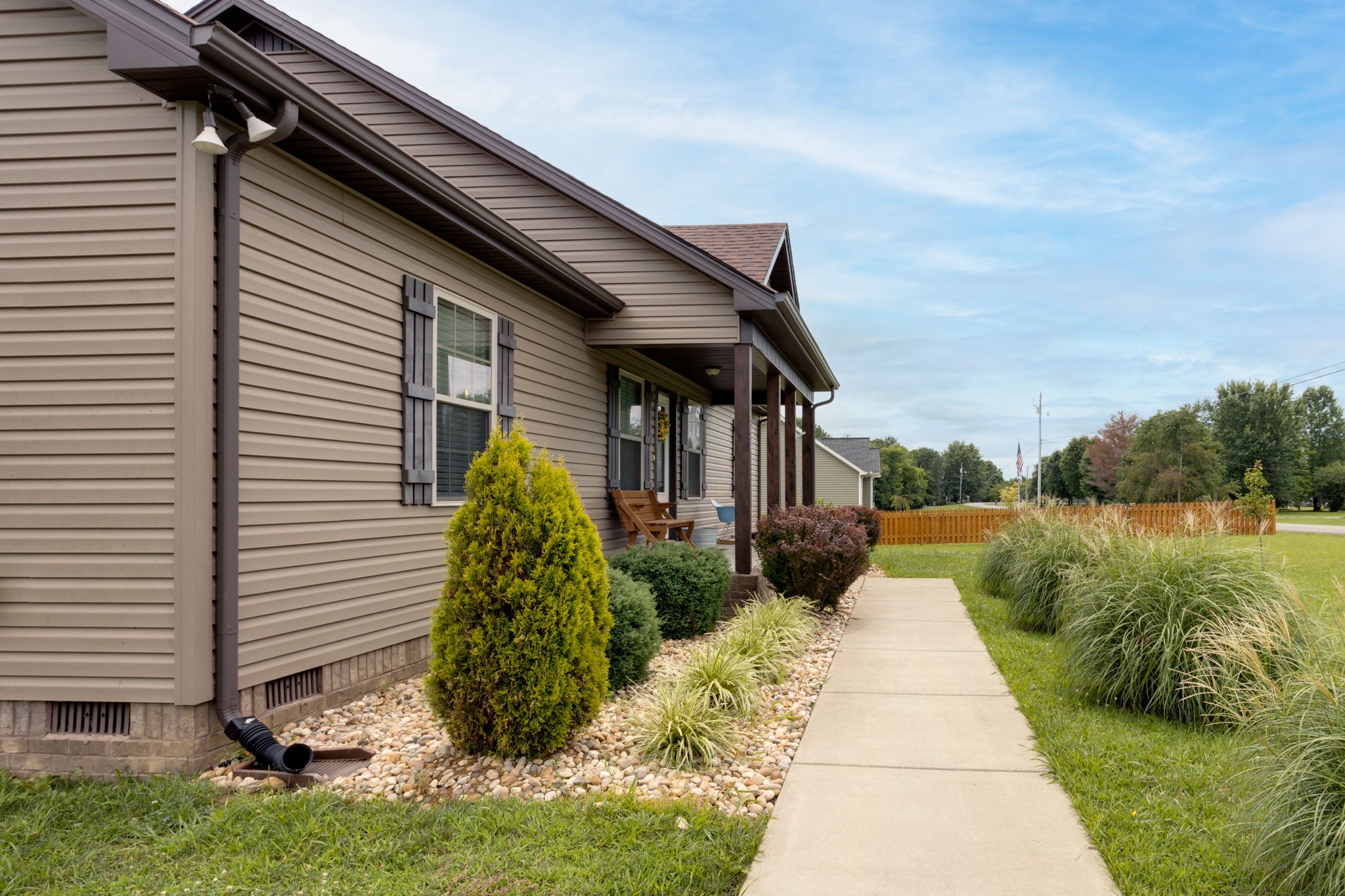 330 Tom Ferrell Road Portland, TN 37148 - Photo 4 of 29 a front view of a house with garden
