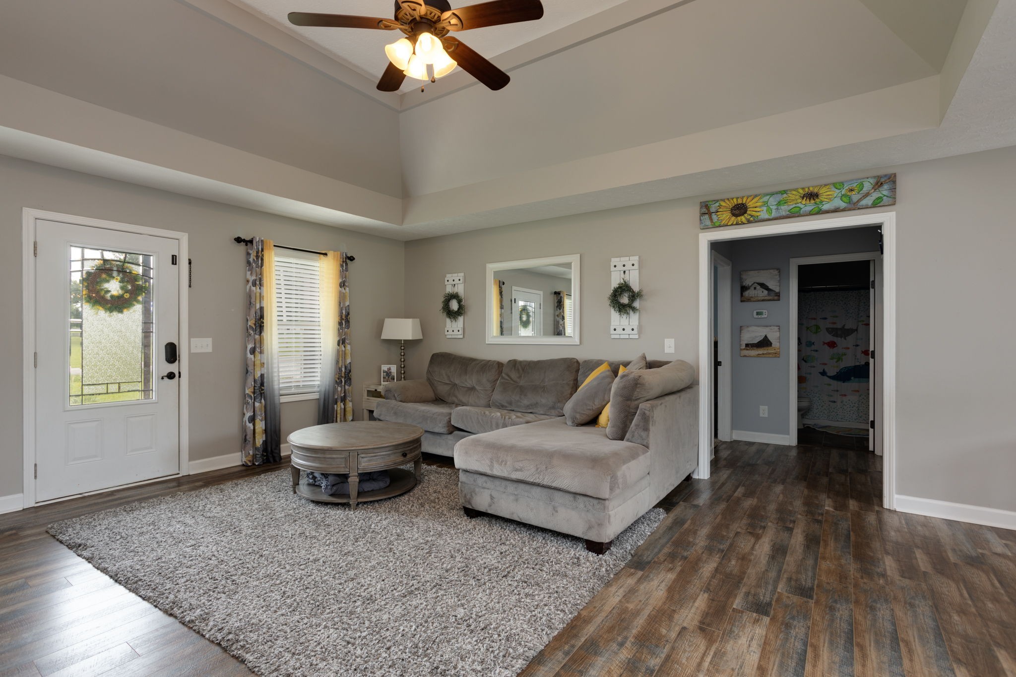 330 Tom Ferrell Road Portland, TN 37148 - Photo 7 of 29 a living room with furniture and wooden floor