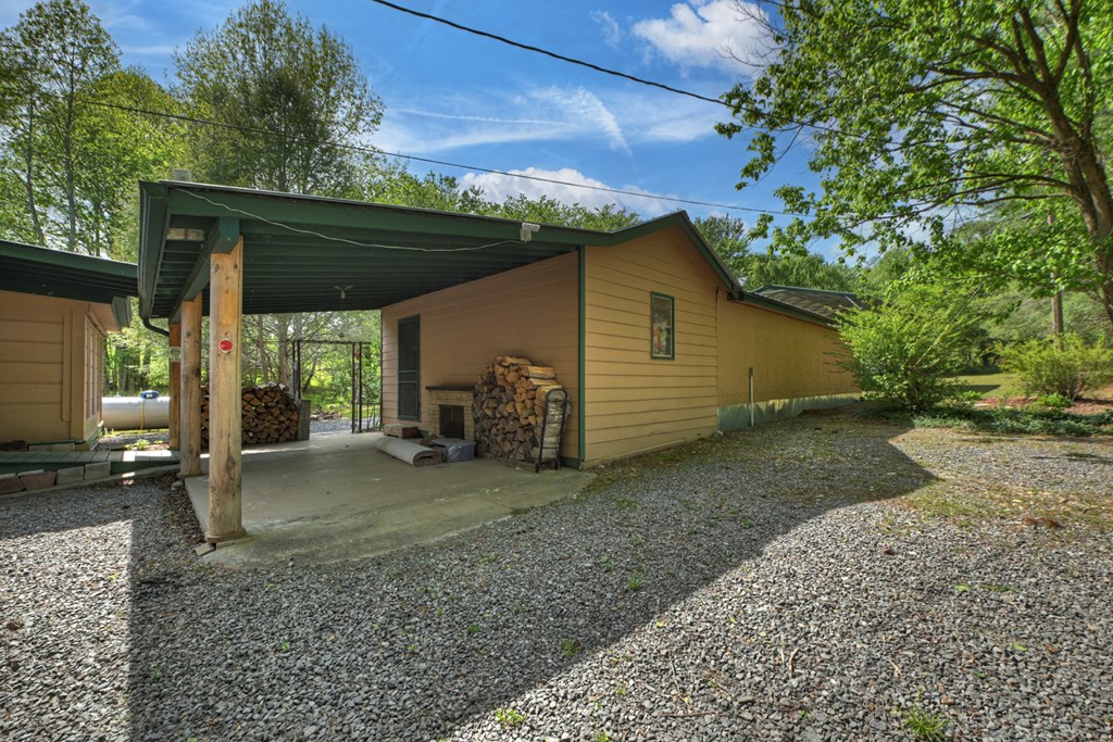 111 Candlewood Lane Blue Ridge, GA 30513 - Photo 27 of 57 a view of a house with a patio