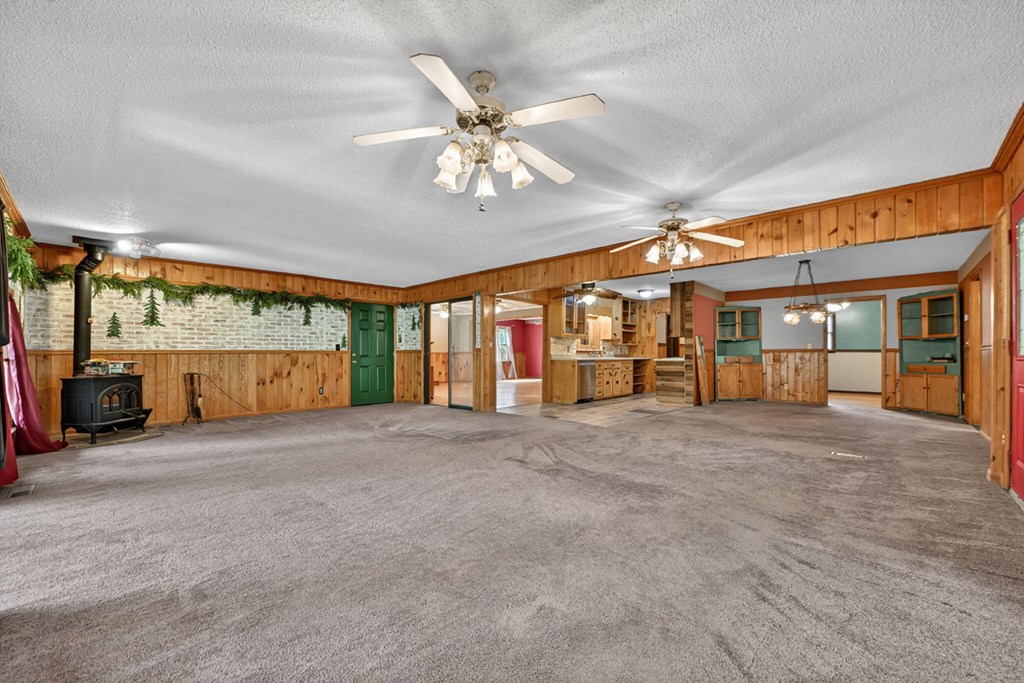 111 Candlewood Lane Blue Ridge, GA 30513 - Photo 36 of 57 a view of an empty room with a ceiling fan