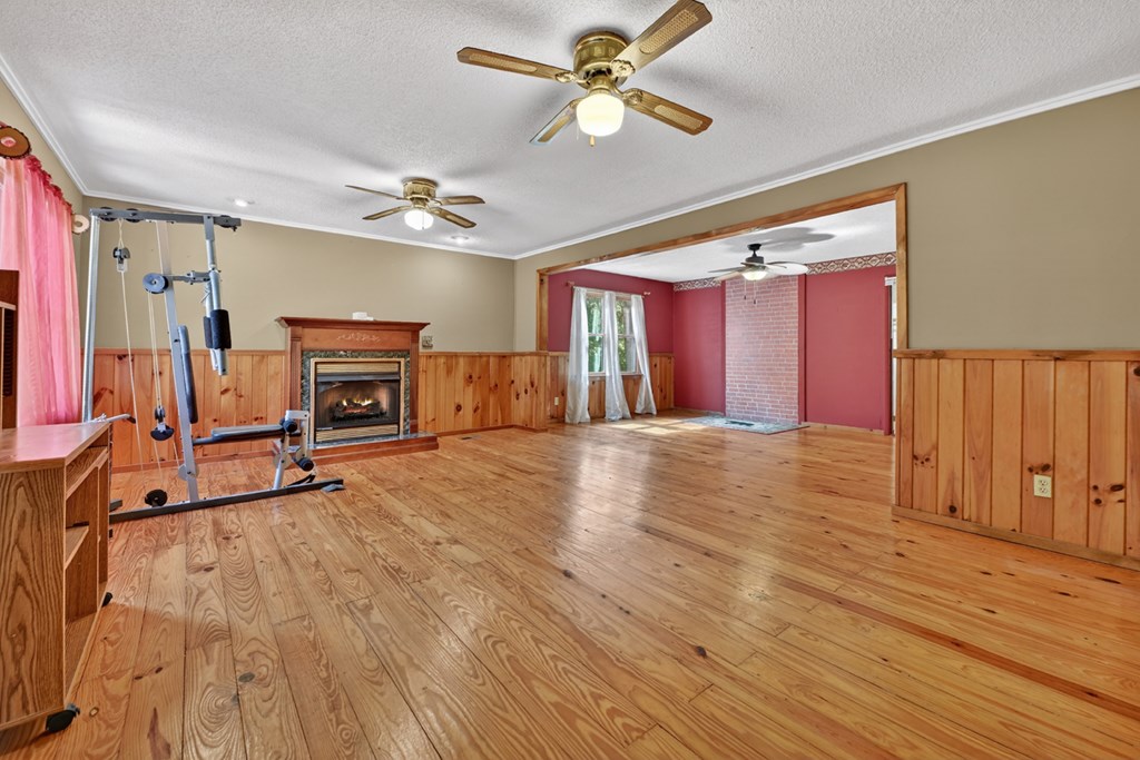 111 Candlewood Lane Blue Ridge, GA 30513 - Photo 38 of 57 a view of livingroom with hardwood floor and a ceiling fan