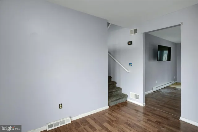 a view of entryway with wooden floor