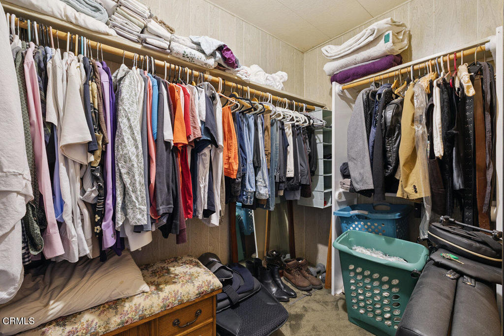 1550 Rory Lane, Unit 82 Simi Valley, CA 93063 - Photo 19 of 27 a view of walk in closet with clothes