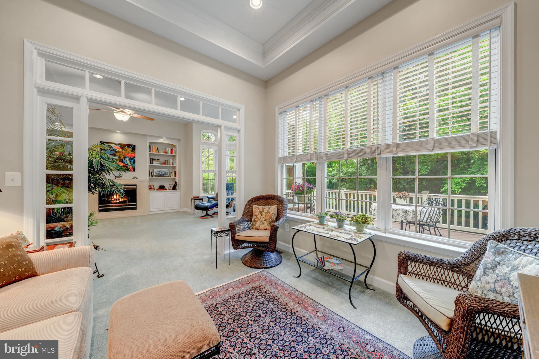1925 Logan Manor Drive Reston, VA 20190 - Photo 14 of 61 a living room with furniture and a large window