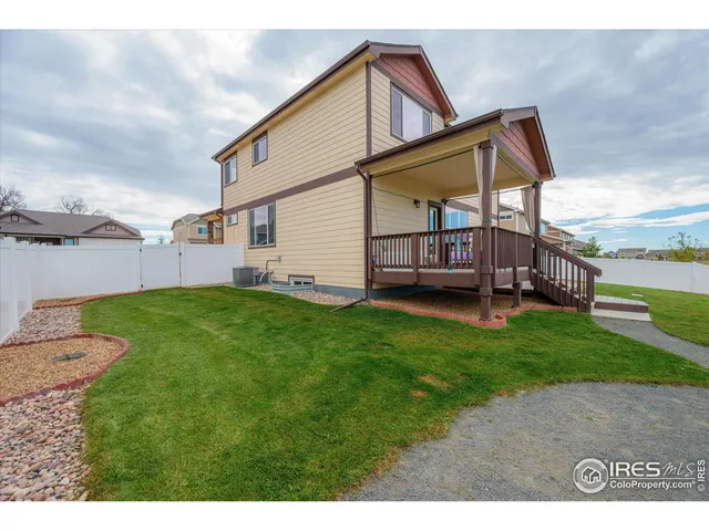 a view of front of house with a yard