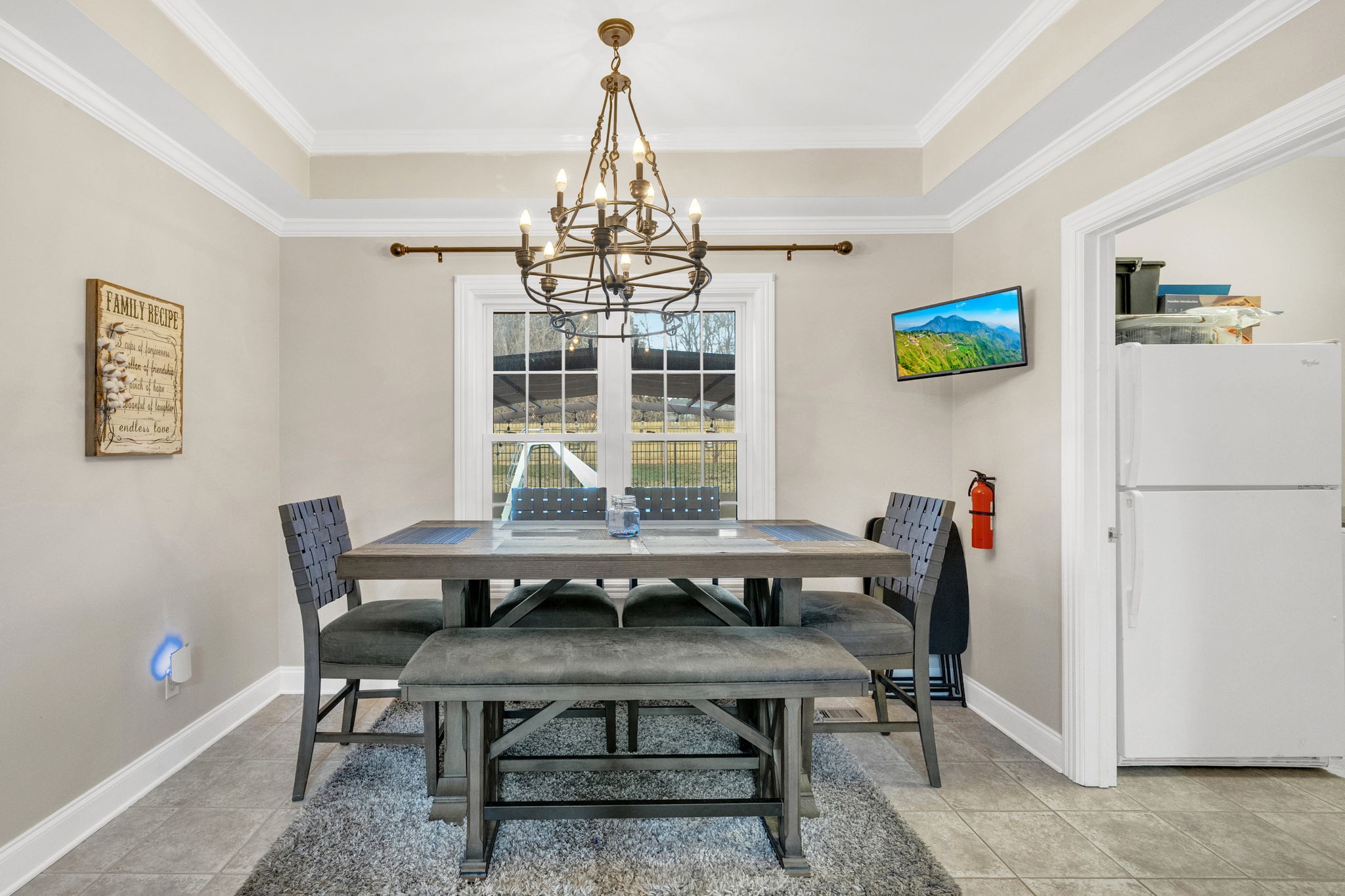 495 Favre Circle Winchester, TN 37398 - Photo 13 of 31 a view of a dining room with furniture a chandelier and a window