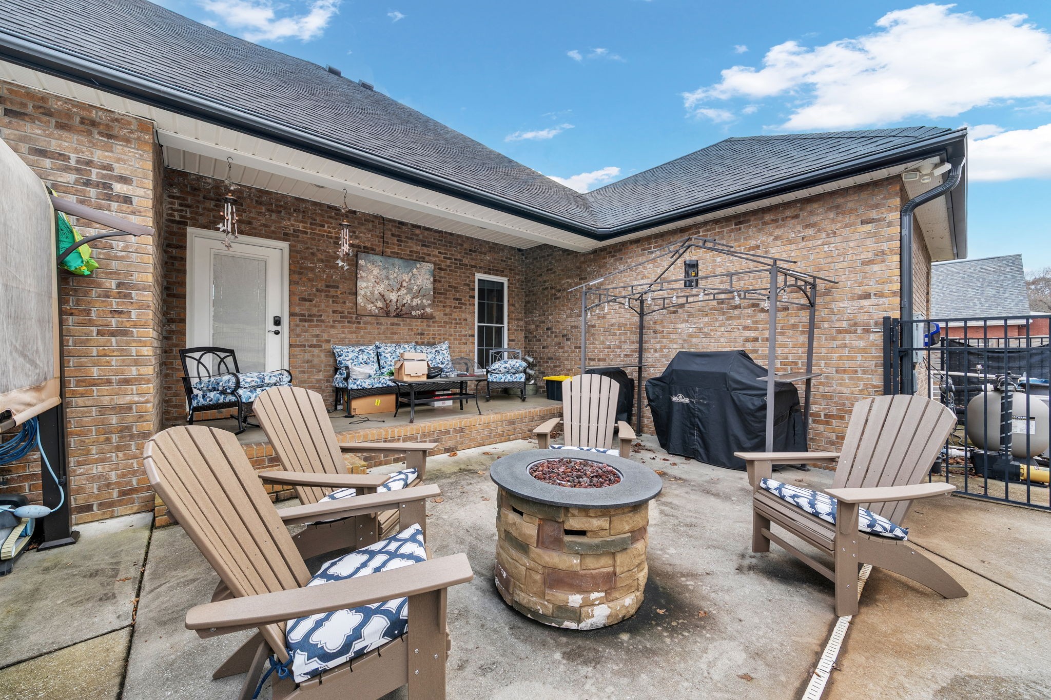495 Favre Circle Winchester, TN 37398 - Photo 29 of 31 a living room with furniture a fireplace and a table