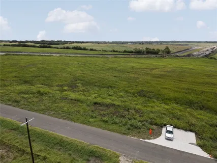 a view of a city with an ocean