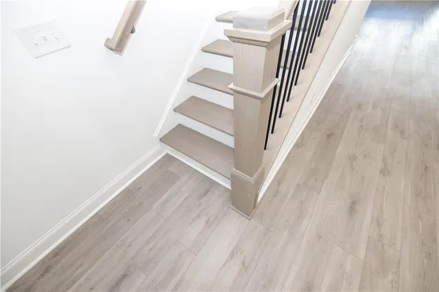 a bathroom with a double vanity sink and mirror
