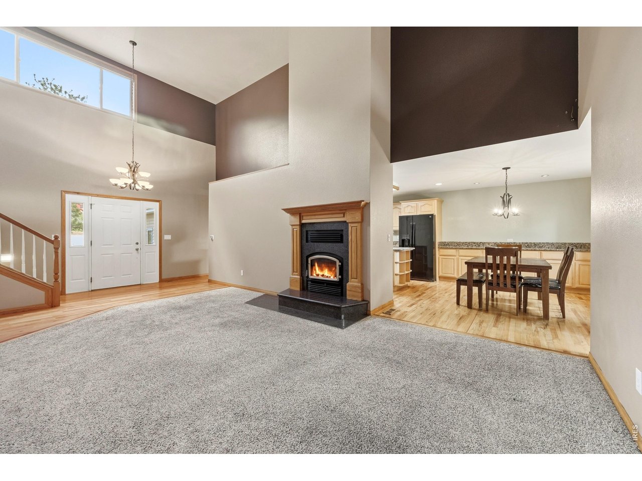 256 Choctaw Road Lyons, CO 80540 - Photo 12 of 50 a view of a livingroom with furniture and a fireplace