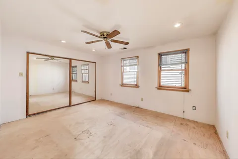 a view of a room that has a window in it