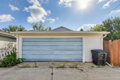 a picture of a bathroom with a shower and a mirror