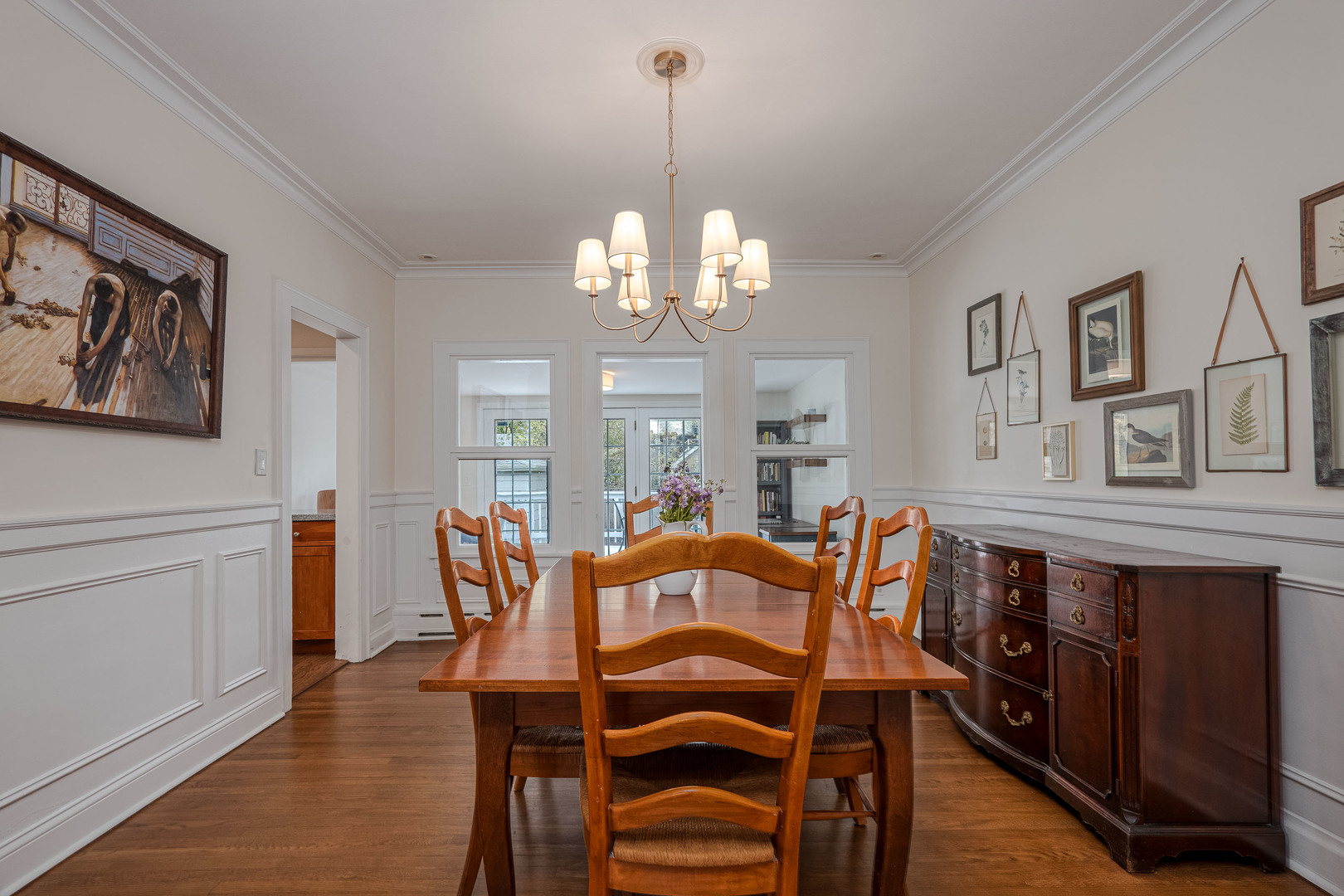 1204 Madison Street Evanston, IL 60202 - Photo 15 of 56 a view of a dining room with furniture and wooden floor