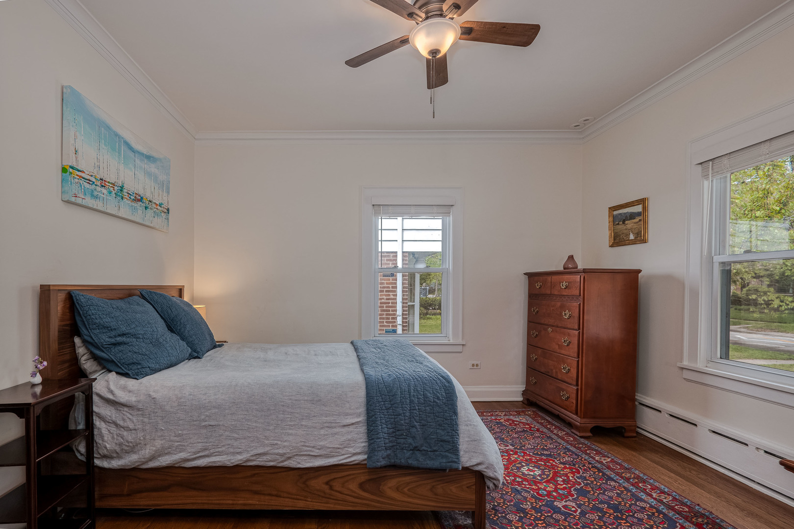 1204 Madison Street Evanston, IL 60202 - Photo 28 of 56 a bedroom with a bed and a window