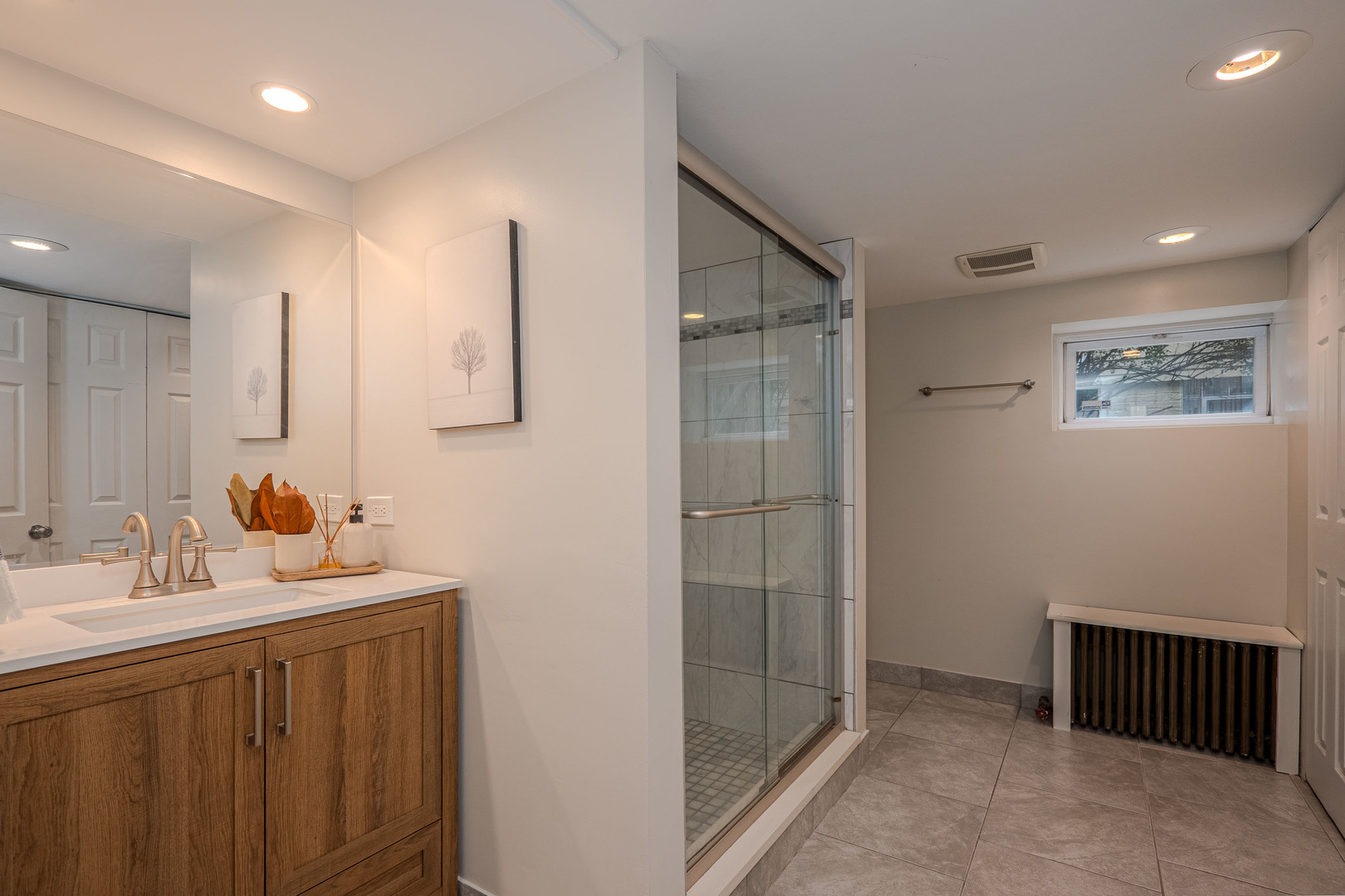 1204 Madison Street Evanston, IL 60202 - Photo 44 of 56 a bathroom with a sink and a mirror