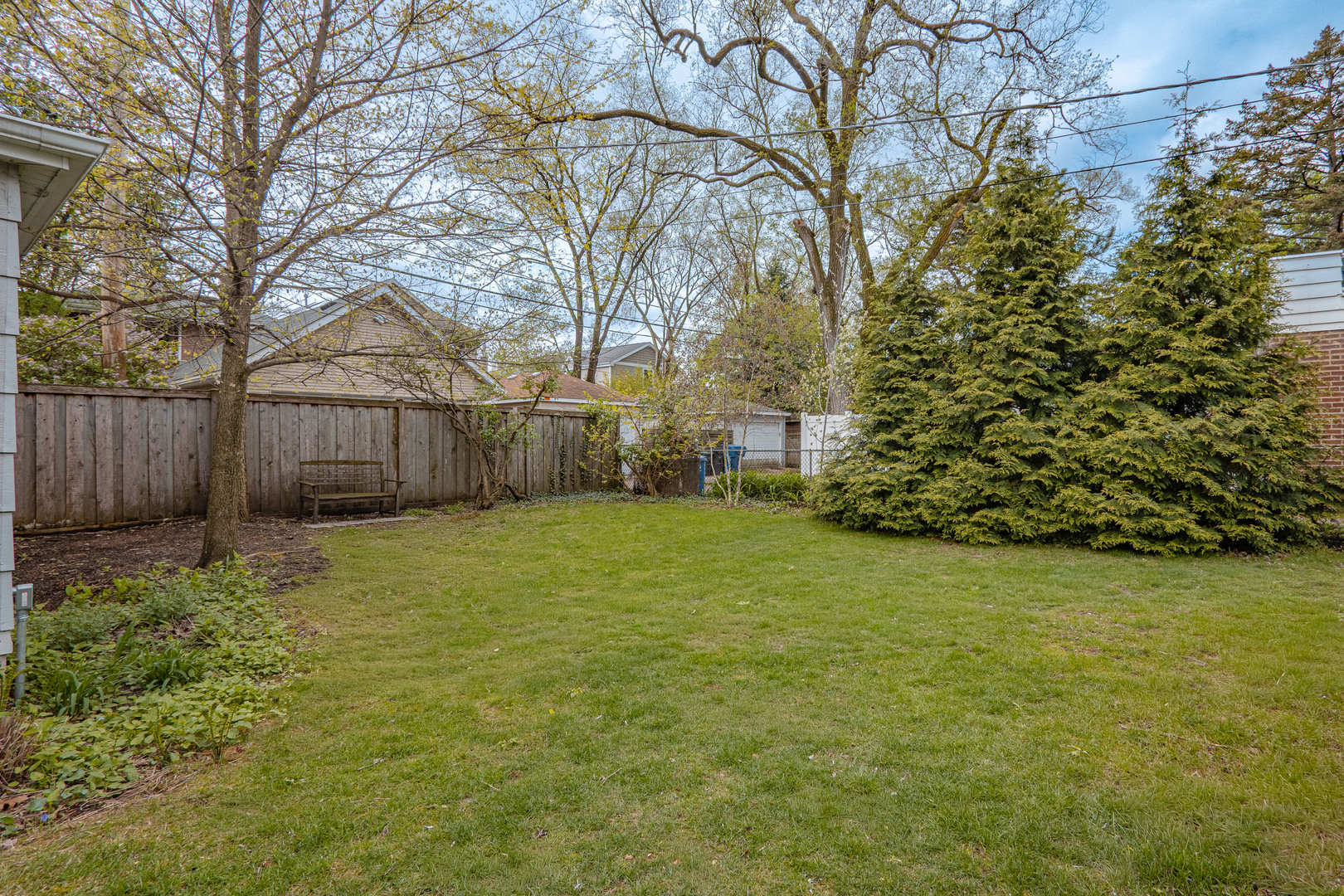 1204 Madison Street Evanston, IL 60202 - Photo 50 of 56 a backyard of a house with lots of green space