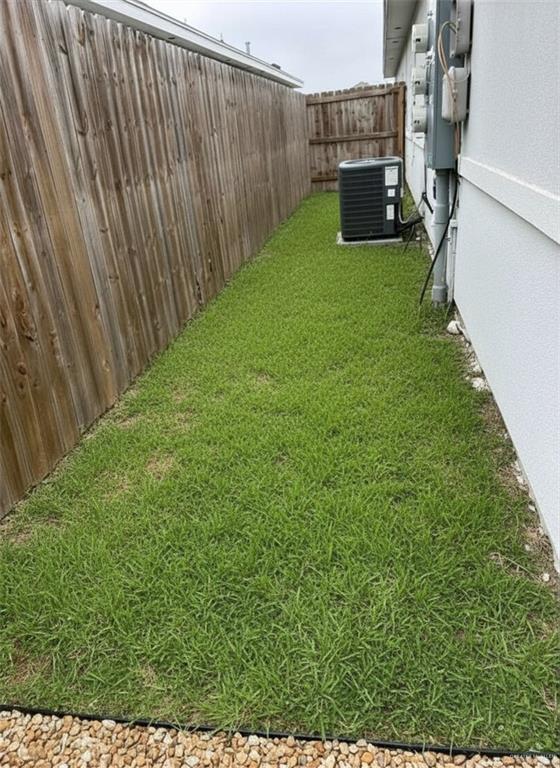 1817 Stauffer Street, Unit 3 Weslaco, TX 78596 - Photo 12 of 12 a view of a backyard with potted plants
