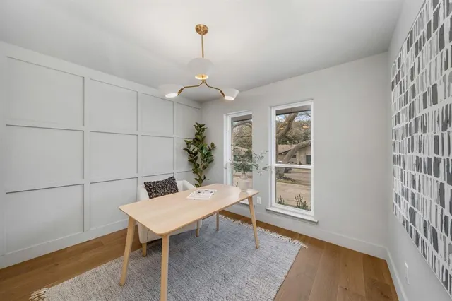 a view of a livingroom with furniture and window