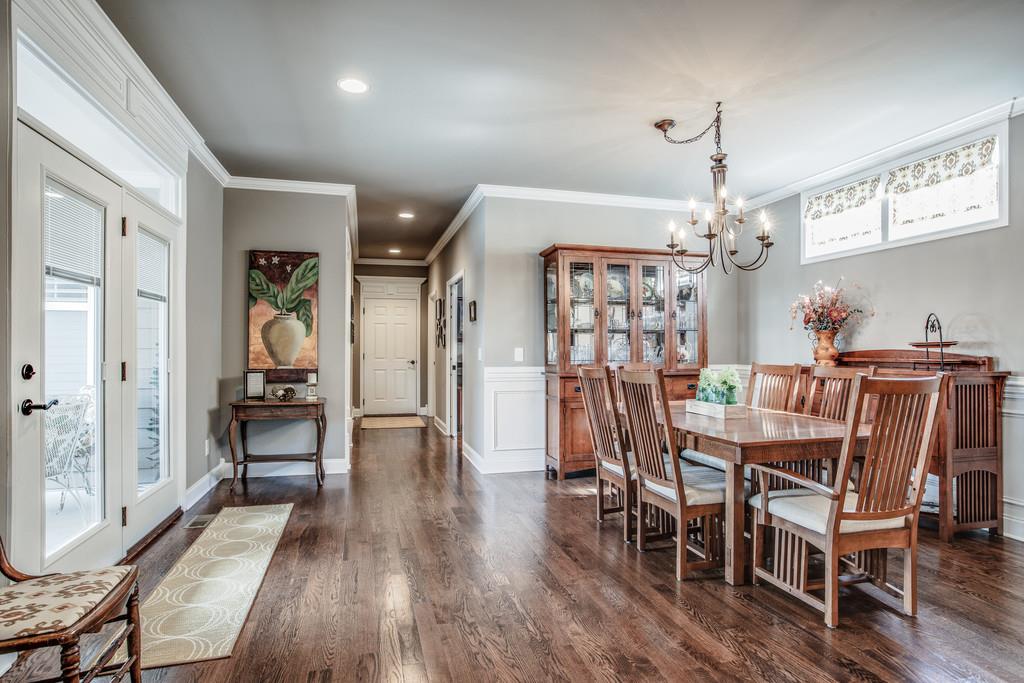 4128 Turnberry Road Spring Hill, TN 37174 - Photo 17 of 30 a view of a dining room with furniture and wooden floor