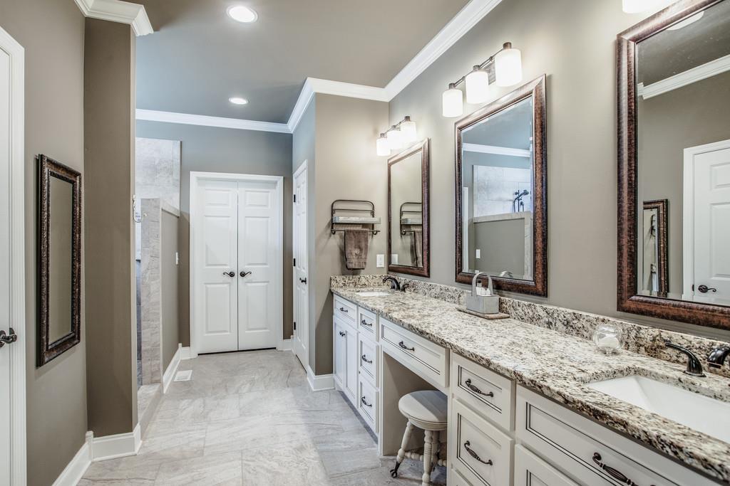 4128 Turnberry Road Spring Hill, TN 37174 - Photo 21 of 30 a bathroom with a granite countertop double vanity sink and a mirror