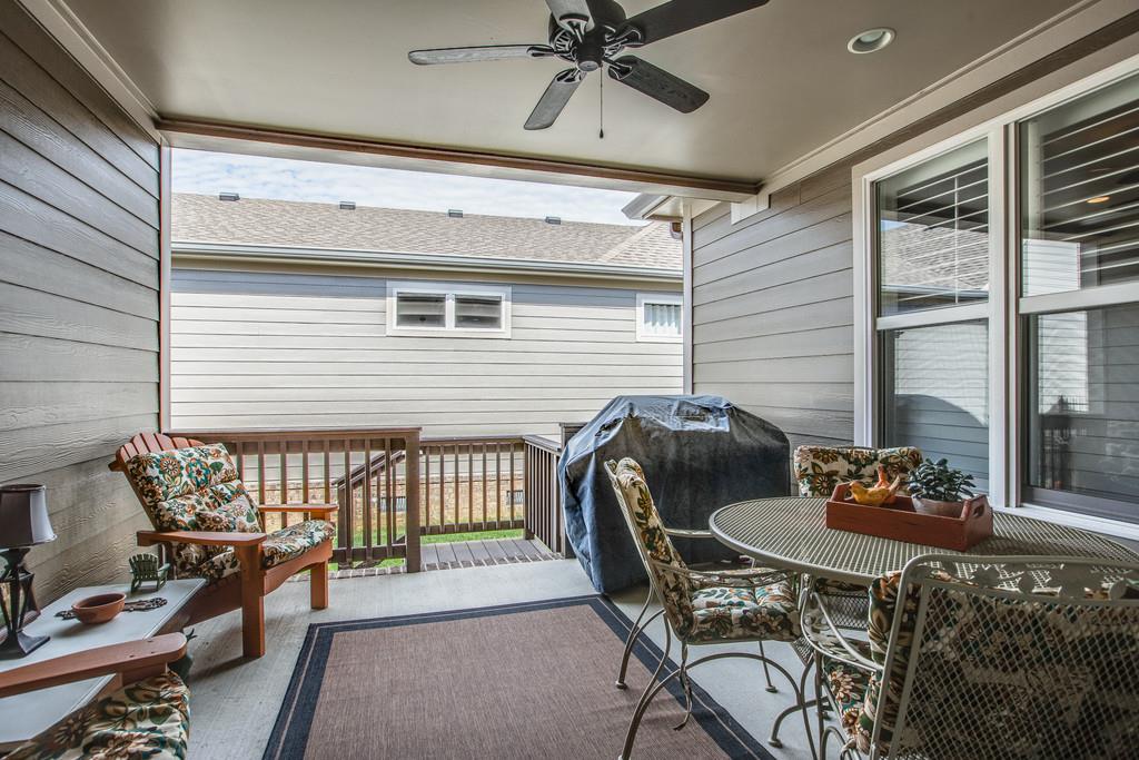 4128 Turnberry Road Spring Hill, TN 37174 - Photo 27 of 30 a view of a patio with a table and chairs
