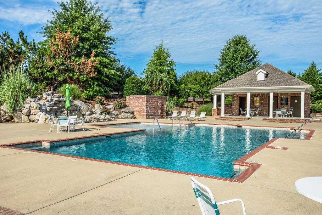 4128 Turnberry Road Spring Hill, TN 37174 - Photo 29 of 30 a view of a house with pool and a chairs