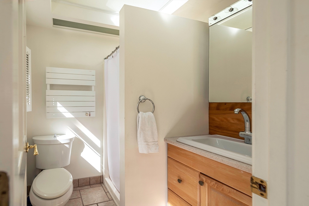 8 Old Essex Road Ipswich, MA 01938 - Photo 28 of 42 a bathroom with a toilet and a shower