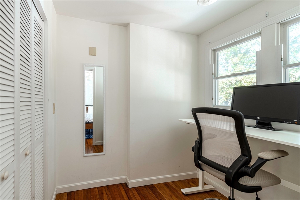 8 Old Essex Road Ipswich, MA 01938 - Photo 32 of 42 a view of a workspace with furniture and a window