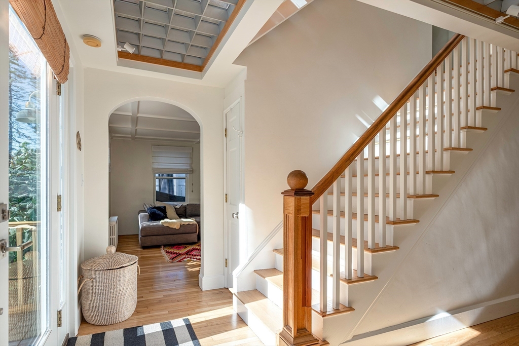 8 Old Essex Road Ipswich, MA 01938 - Photo 9 of 42 a view of entryway and hall with wooden floor