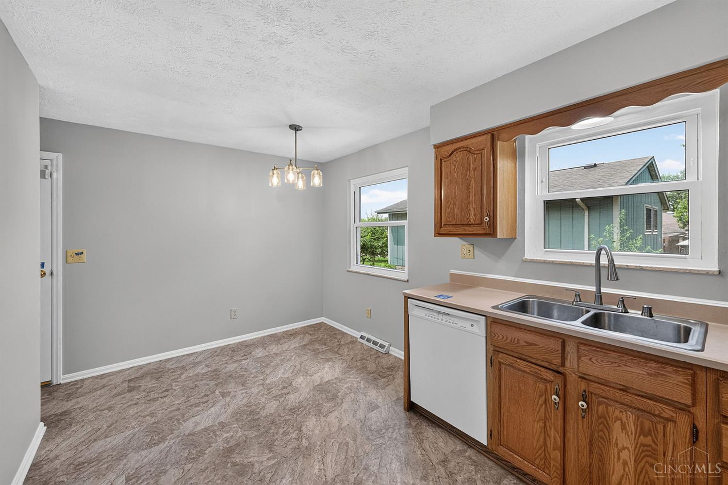 2086 Resor Road Fairfield, OH 45014 - Photo 16 of 42 Eat-in kitchen offers room for casual dining while maintaining an easy connection to the rest of the home.