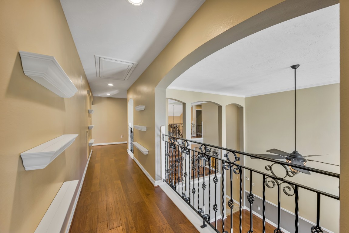 10410 Kilbride Way Court Spring, TX 77379 - Photo 33 of 49 Imagine your gallery wall down this walk-way leading to the game room, and overlooking the formal living area.