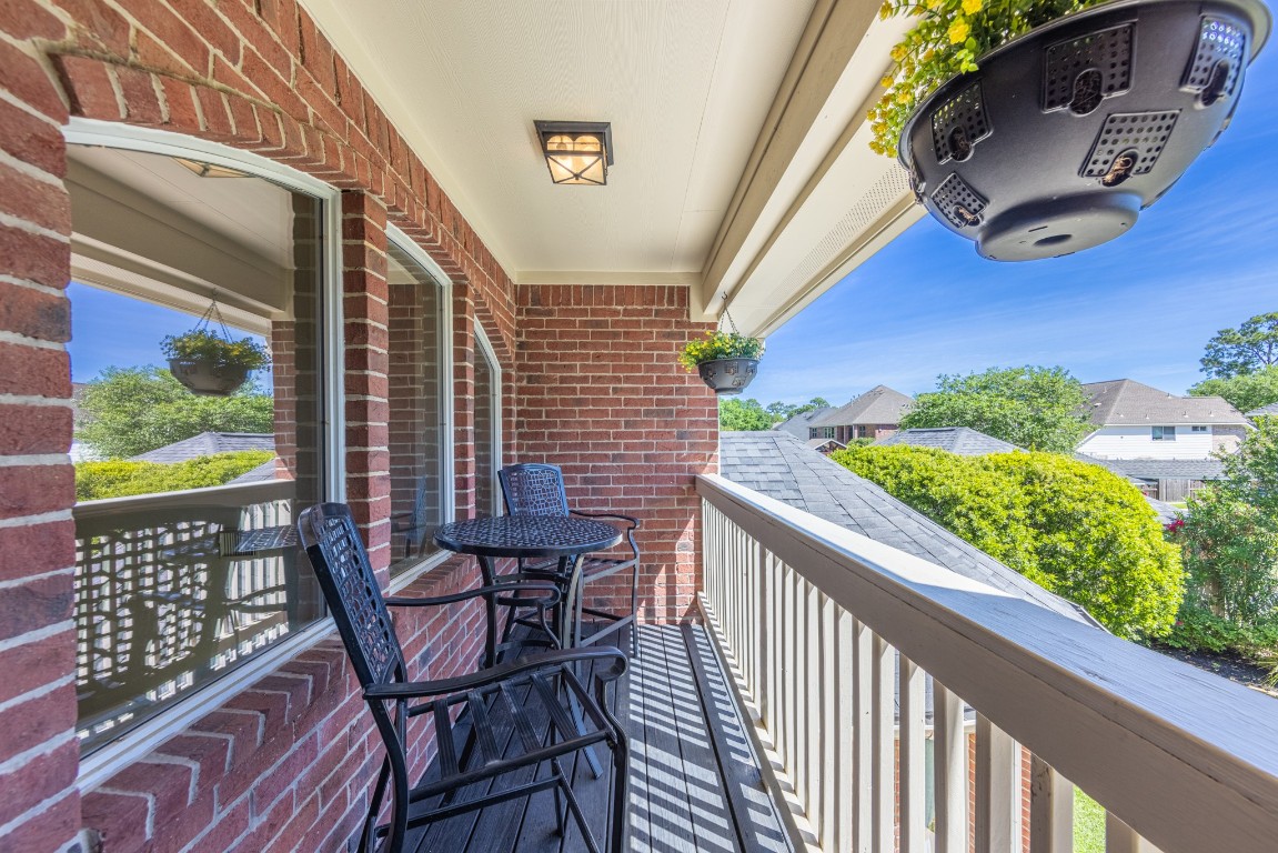 10410 Kilbride Way Court Spring, TX 77379 - Photo 36 of 49 2nd floor balcony from the game room overlooks the park-like setting in the backyard.