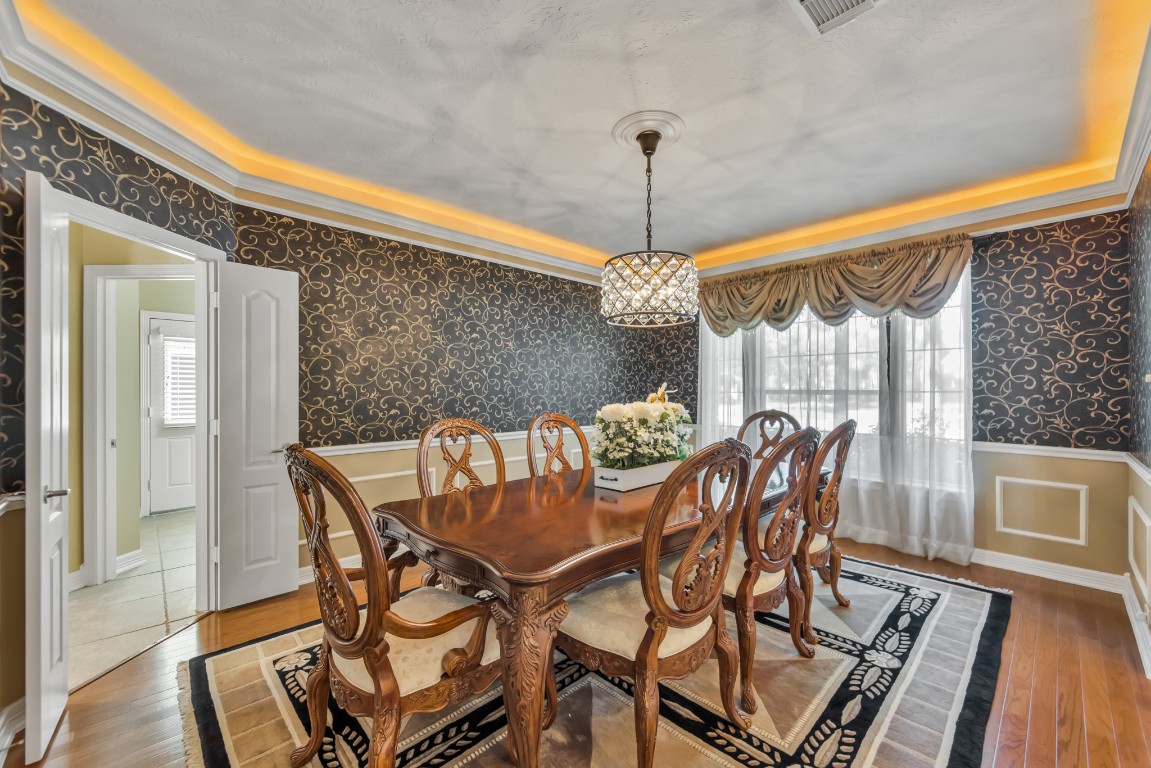 10410 Kilbride Way Court Spring, TX 77379 - Photo 6 of 49 Formal dining room with accent lighting, closet to display your glassware and a view of the lush front yard.