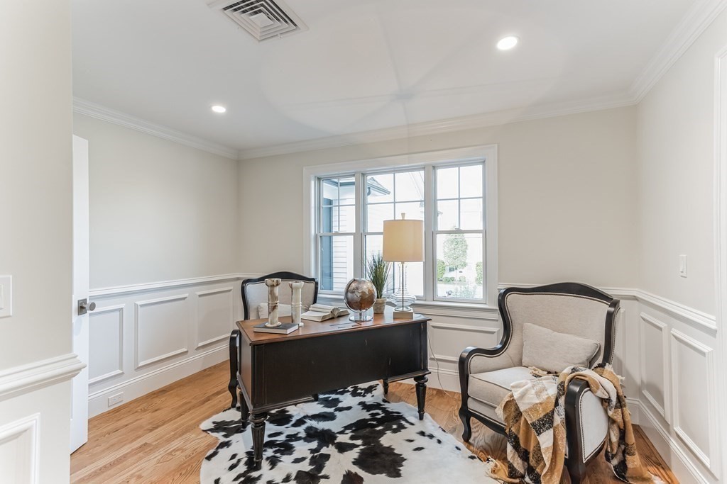 185 Hillside Avenue, Unit 185 Needham, MA 02494 - Photo 14 of 32 a room with furniture and two window
