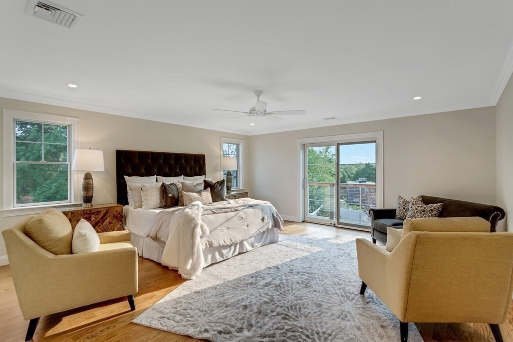 185 Hillside Avenue, Unit 185 Needham, MA 02494 - Photo 15 of 32 a bed room with bed and windows