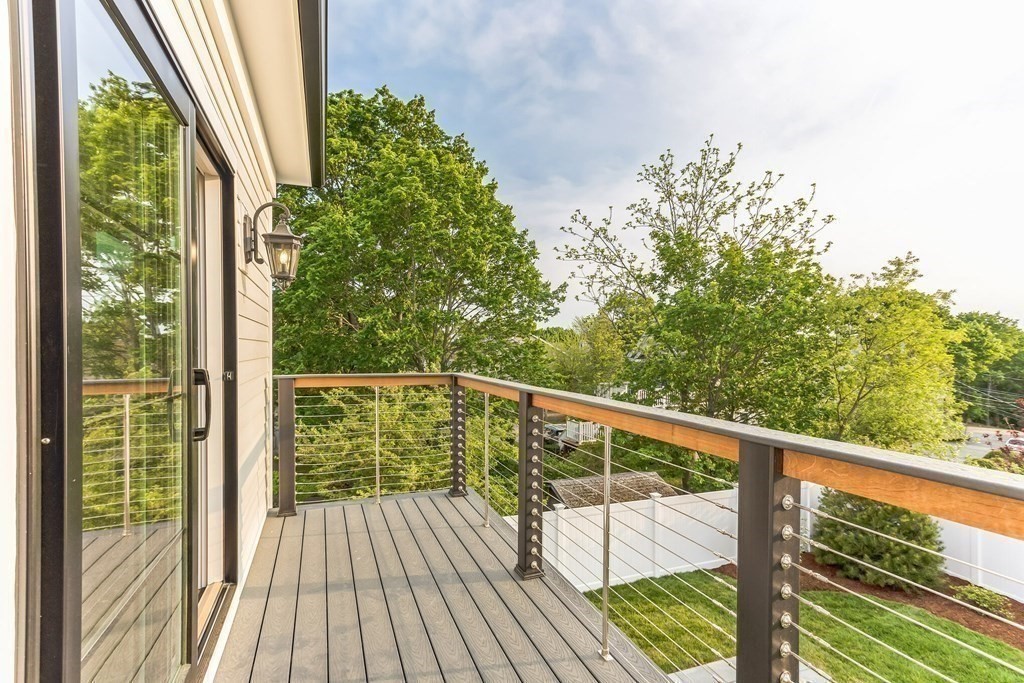 185 Hillside Avenue, Unit 185 Needham, MA 02494 - Photo 17 of 32 a view of balcony with wooden floor