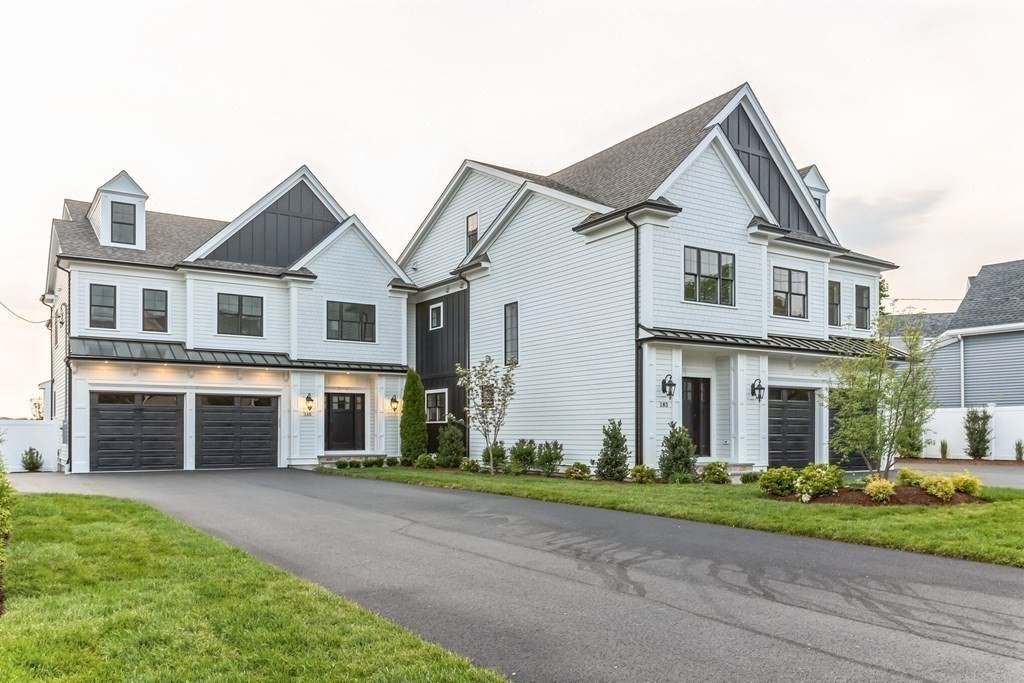 185 Hillside Avenue, Unit 185 Needham, MA 02494 - Photo 29 of 32 a front view of a house with a yard