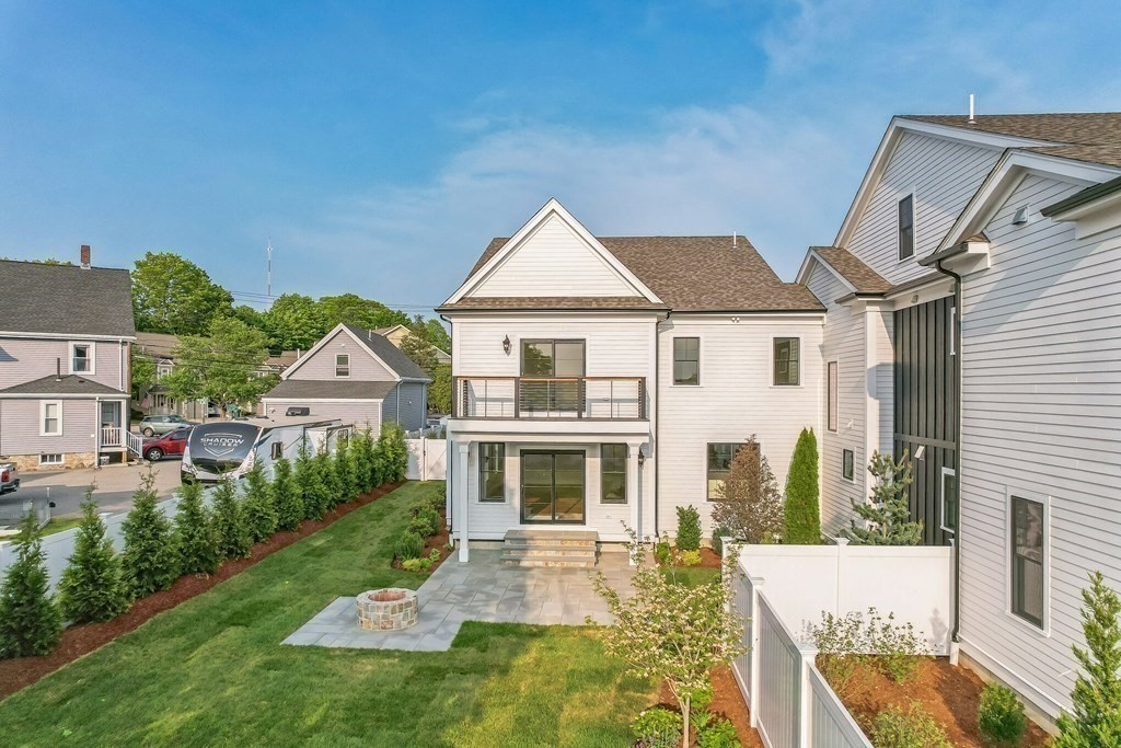 185 Hillside Avenue, Unit 185 Needham, MA 02494 - Photo 32 of 32 a front view of a house with garden