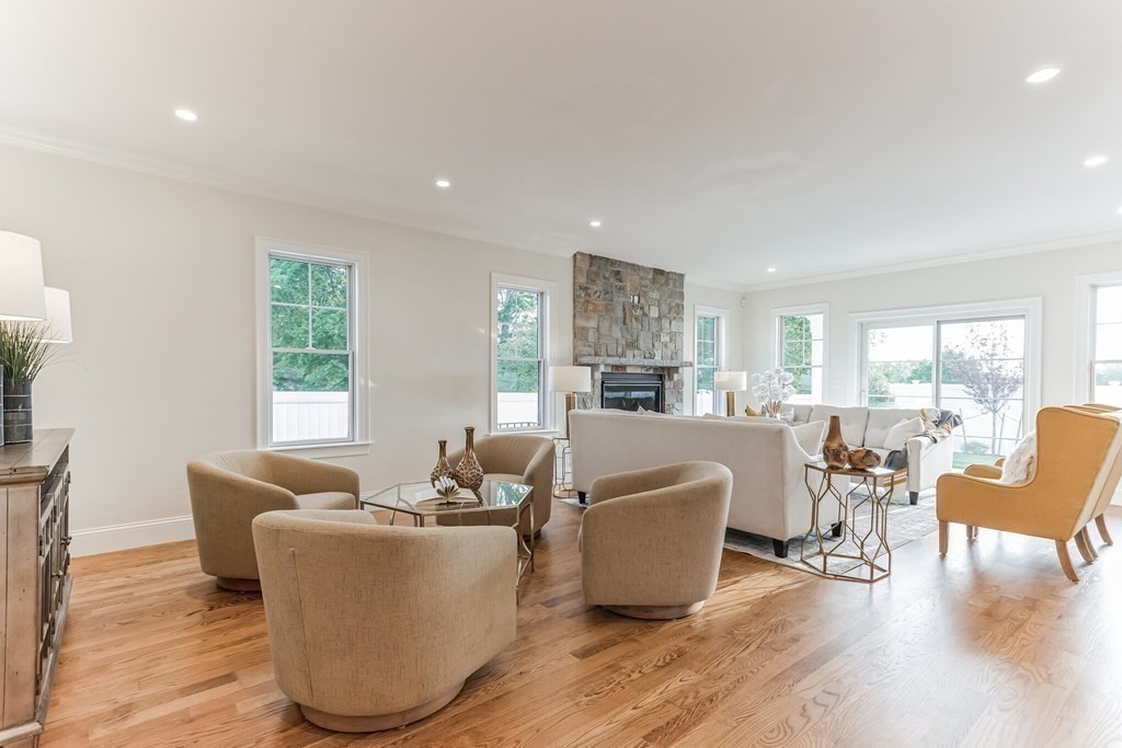 185 Hillside Avenue, Unit 185 Needham, MA 02494 - Photo 10 of 32 a living room with furniture and a large window